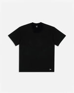 Patta black tubular short-sleeve t-shirt with a white script logo near the bottom hem.
